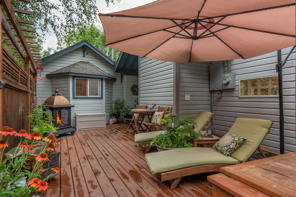Your side entry deck gives you 2 lounge chairs, a table for two, fireplace and umbrella.