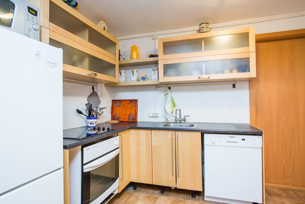 In the kitchen you can find tableware, pots, pans, a toaster, coffee maker and a kettle.