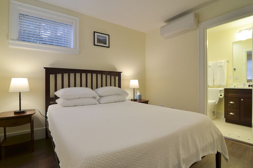 Bedroom 1: Queen bed and ensuite shower bath