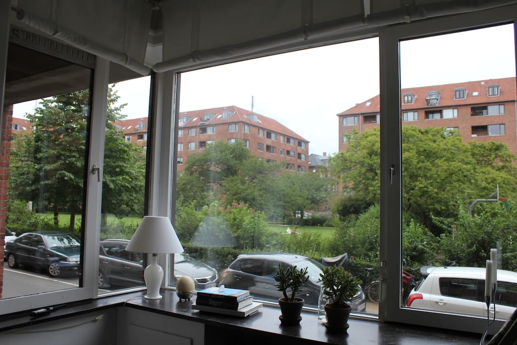 View from the living room to Hostrups garden with a nice play ground just outside