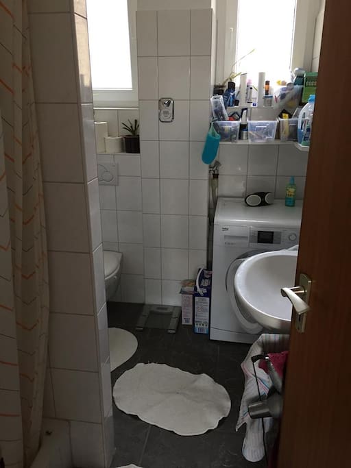 Shared Bathroom with shower and toilette