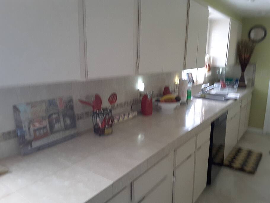 Large kitchen with two sinks.