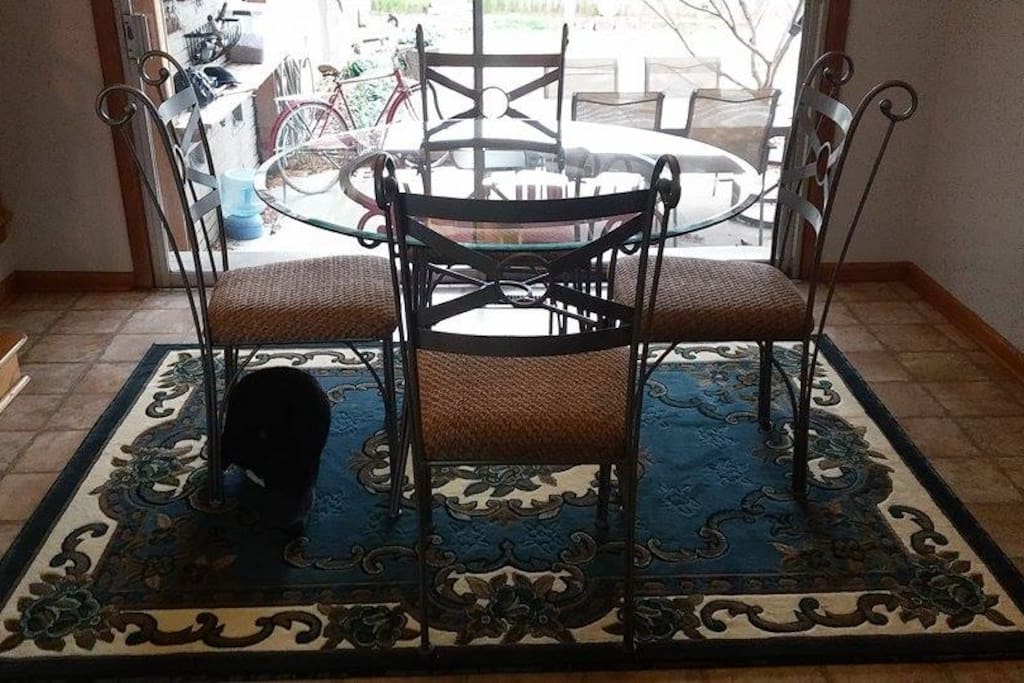 Kitchen table looking out on the patio.