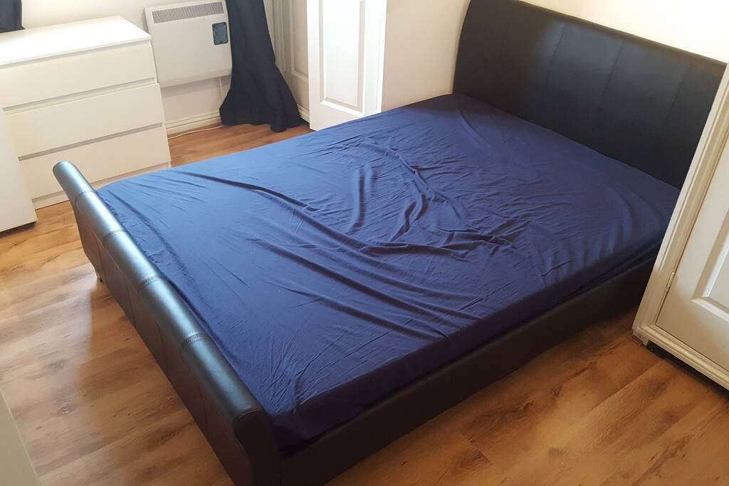Modern double bed with new mattress, very spacious