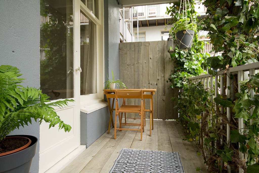 large green balcony at the back