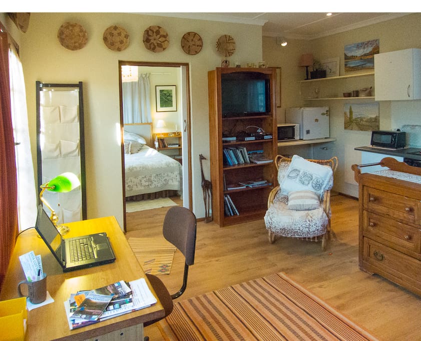 Living area, with bedroom beyond