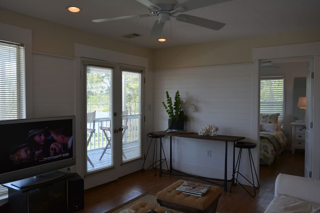 Full wrap around porch with lake view across the street