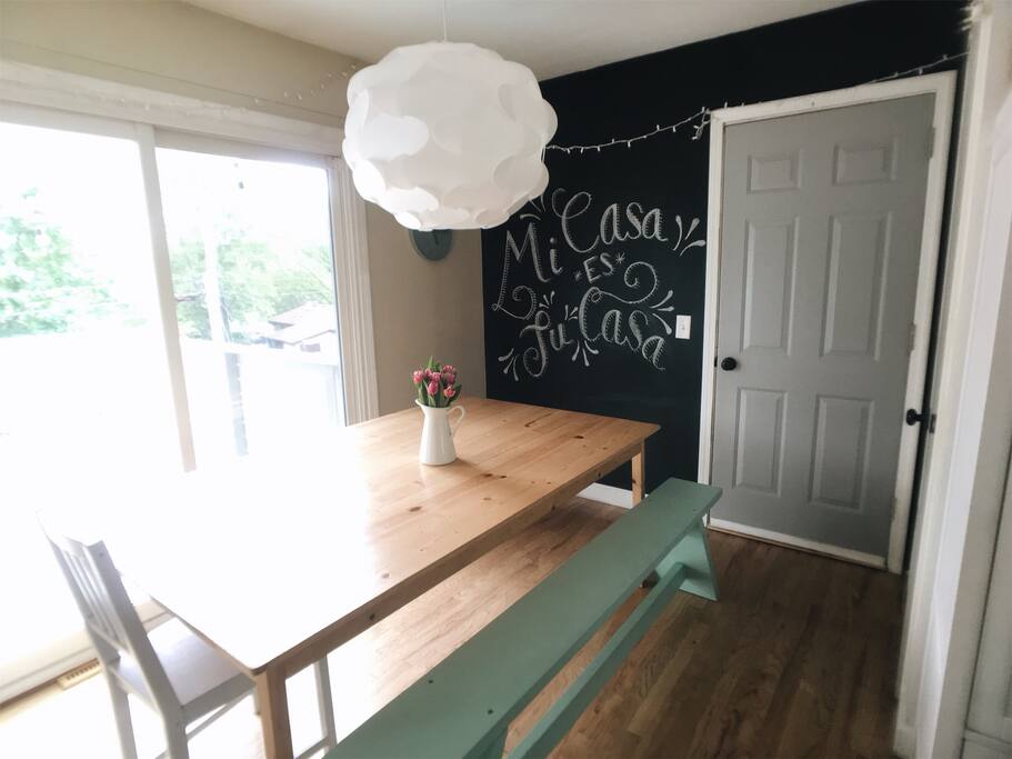 Dining area off kitchen with patio door access to balcony-upper level