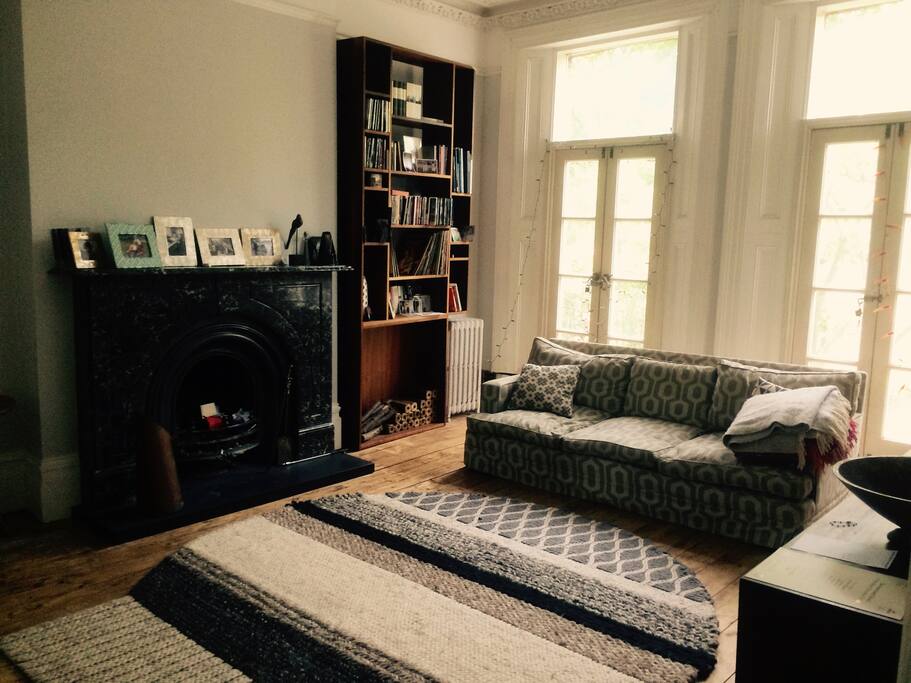 Back living room with open fireplace