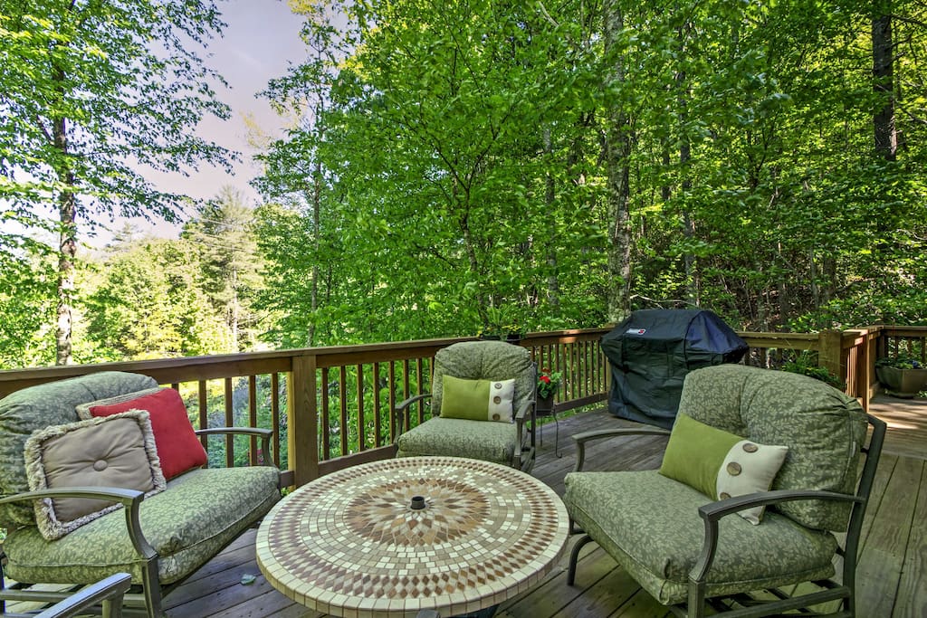 Up to 6 guests can enjoy stunning forest views from the spacious deck!
