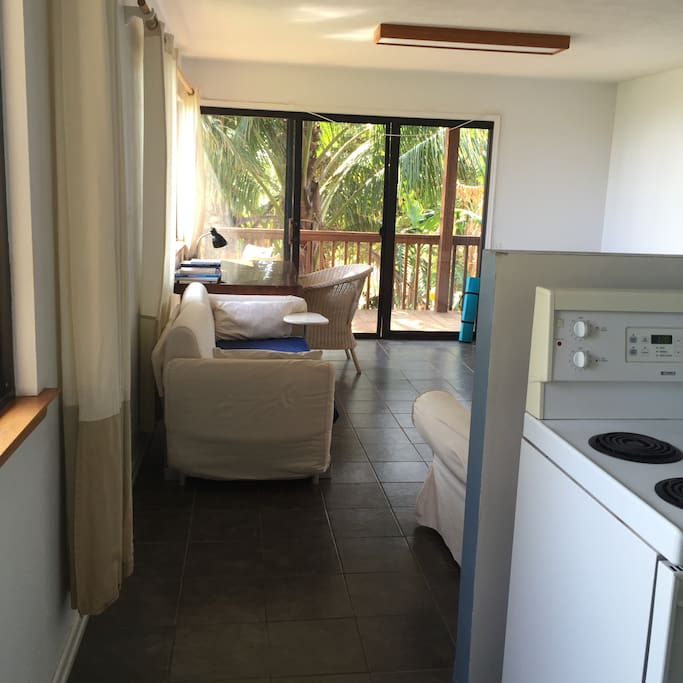 Downstairs view of kitchen and living room
