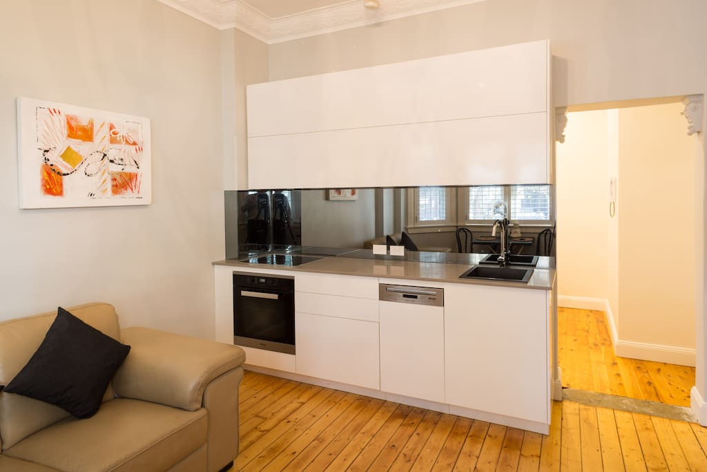 Modern kitchen with Miele oven / cooktop and dishwasher