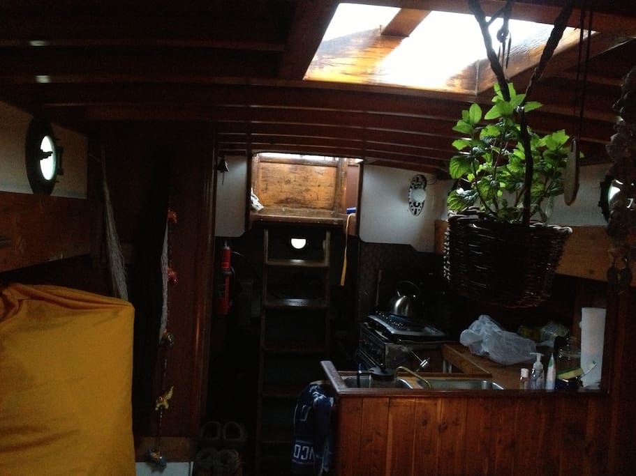 Galley kitchen, propane cooktop, oven in the future
