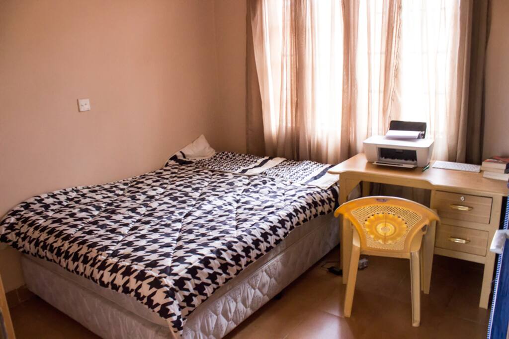 The bedroom with a working desk