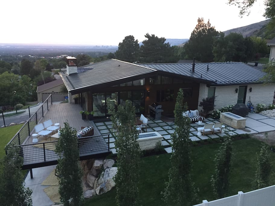 This outdoor living spaces are the best part of my home... outdoor dining and lounge furniture to watch the sun set over Salt Lake City and reflect off Mount Olympus!
