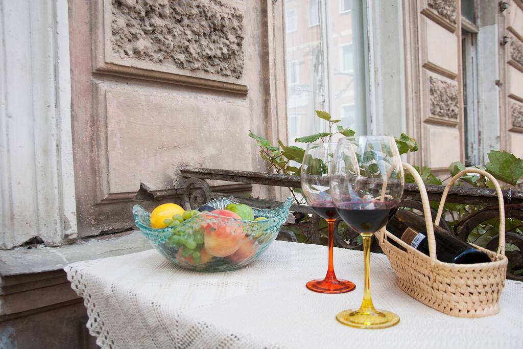 This balcony is a great place to enjoy your morning coffee. Or not coffee. A bottle of homemade red wine is waiting for you in the fridge pon arrival! | Этот балкон - идеальное место, чтобы насладиться утренним кофе. Или не кофе. Бутылочка домашнего красного вина всегда ждет вас в холодильнике по приезду.