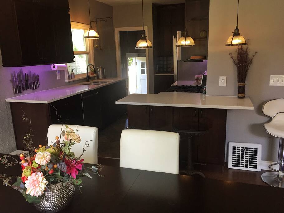 Remodeled kitchen with new appliances and lots of cookware