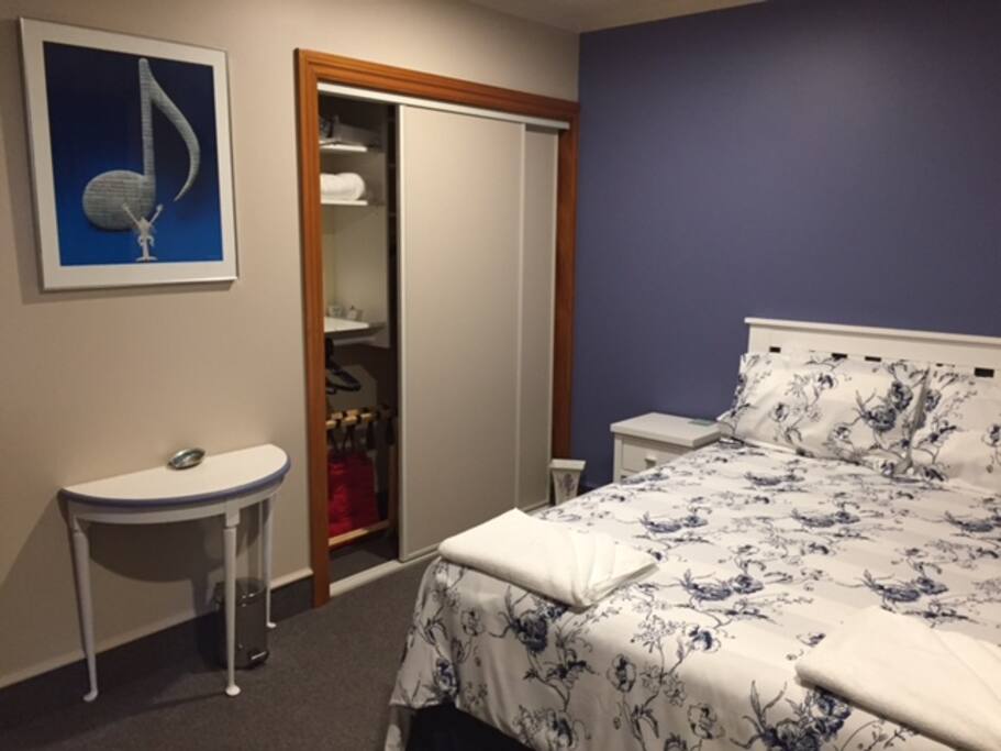 Bedroom with full size wardrobe. Bed has feather duvet and electric blankets.
There are sun blinds as well as black out lining on the curtains.