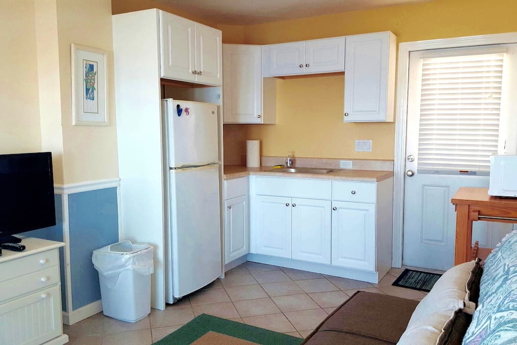Studio kitchen includes 2 burner cook top, microwave, toaster oven & all housewares.