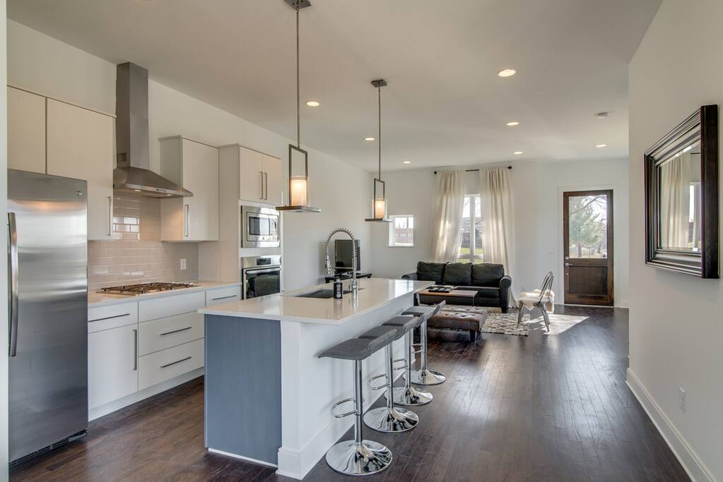 Our kitchen and island sits right off our living room