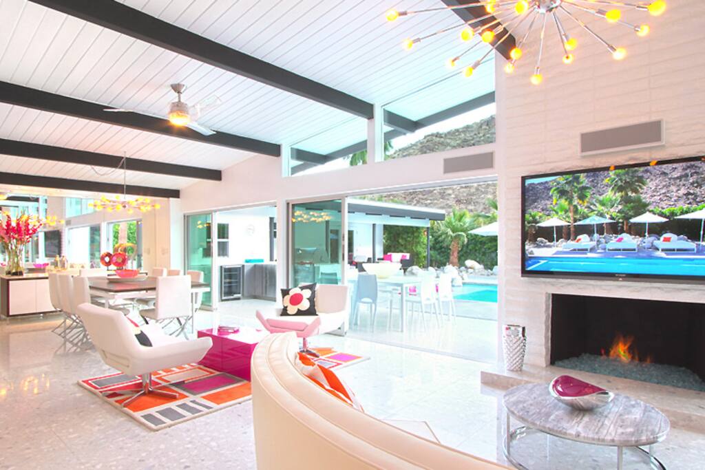 Mid-Century glam design and furnishings. Indoor/outdoor living. Bright, open and fun!