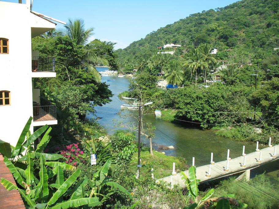 The foot bridge to cross the river. View toward the ocean.