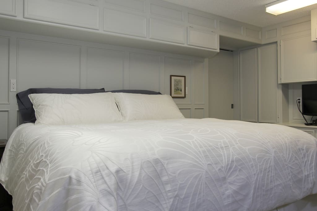 A new high quality king bed and linens will tuck you in!