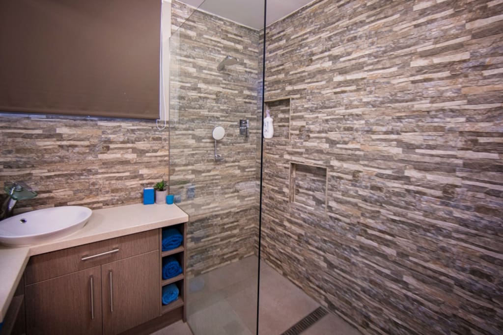 Amazing walk in shower complete with adults and kids shower heads!!