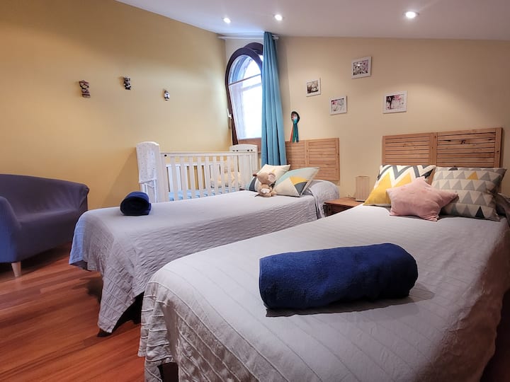 Bedroom 2: 2 single beds + crib. Access is through the master bedroom  