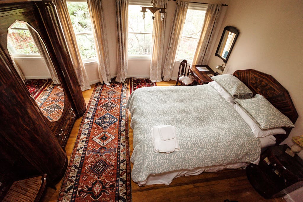 Birds eye view. Down comforter and down/feather pillows with very nice sheets.
