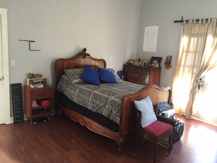 The room features a full sized bed