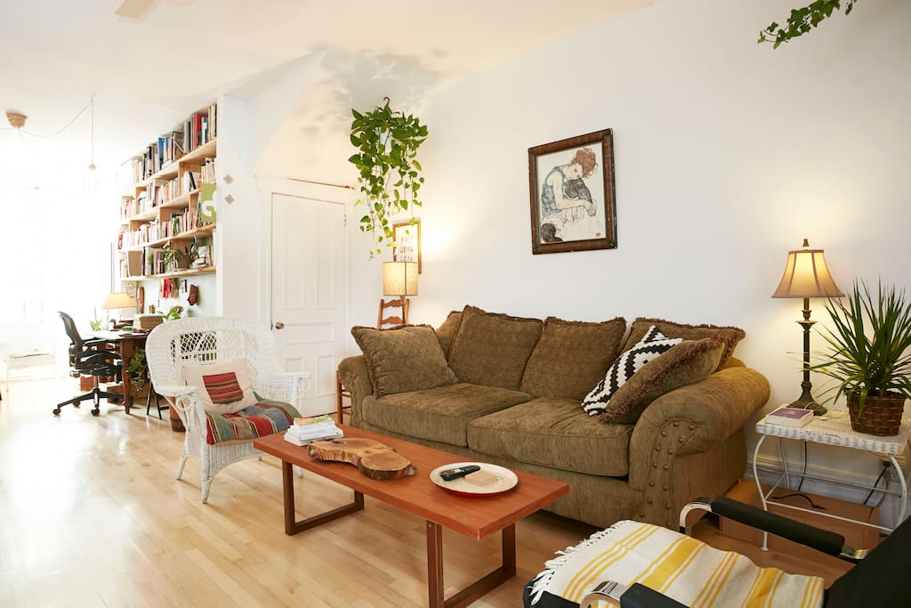 Middle large space with living room, dining room, study and desks, library, sound system...