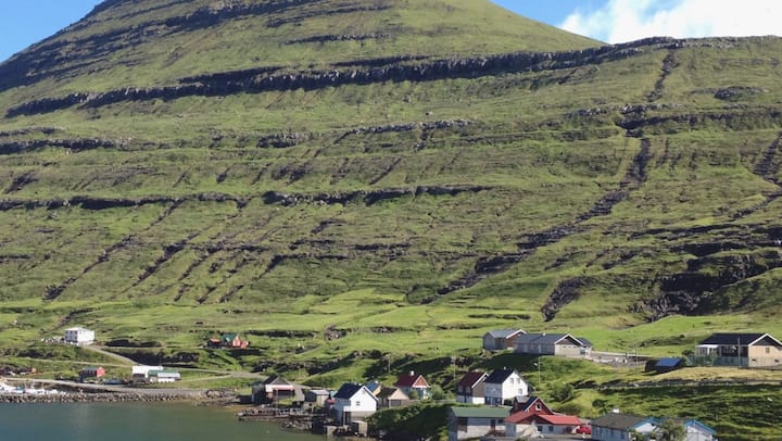 cozy home by the river; funningsfjørður, eysturoy