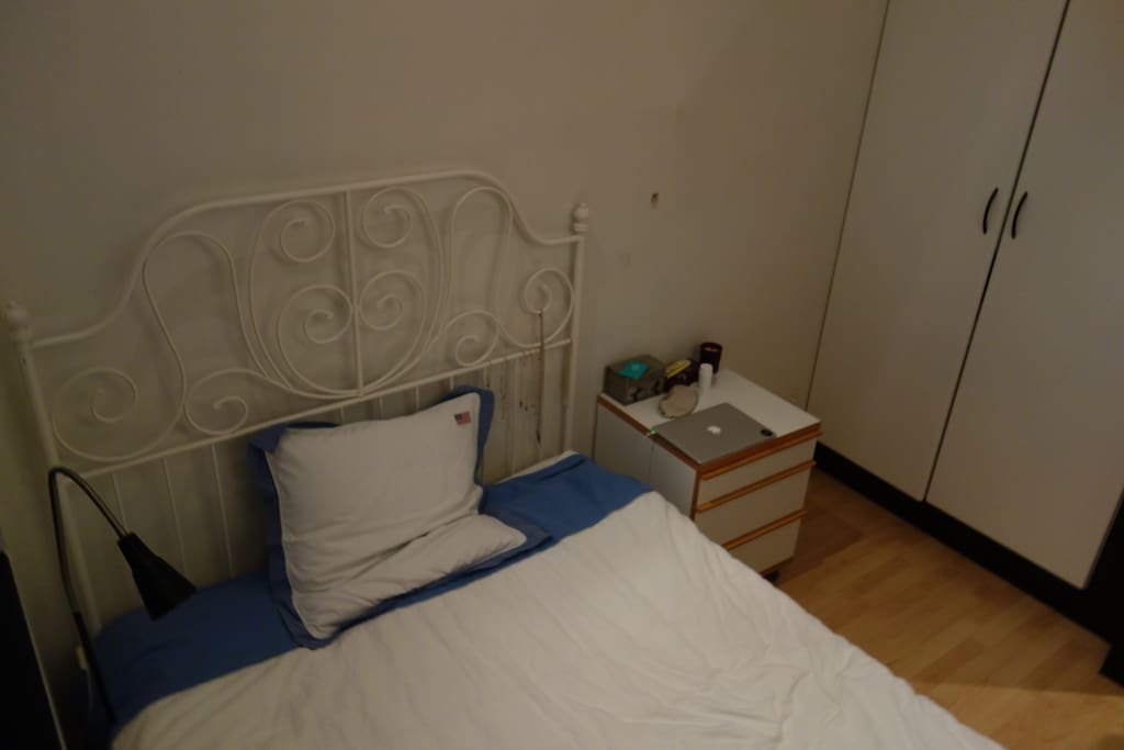 Room with a double bed and a huge wardrobe