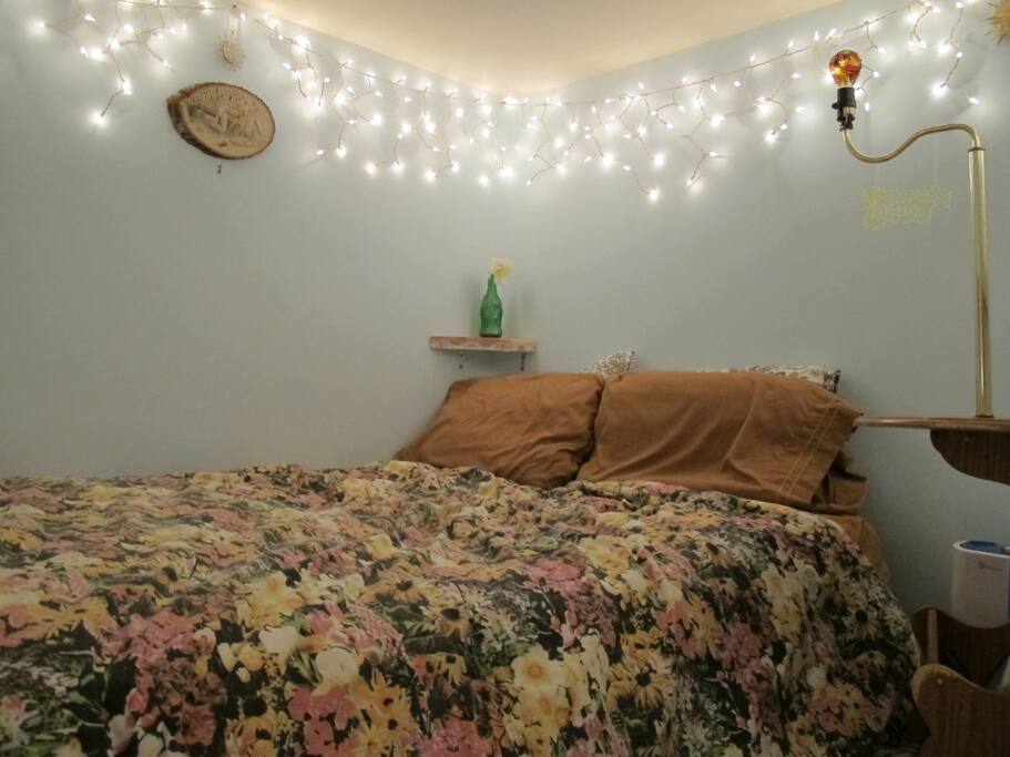 Upstairs, bed area of cozy loft bedroom.