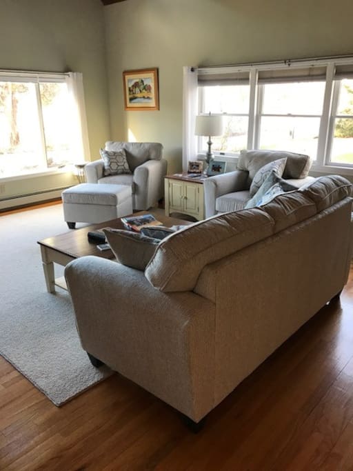 Great Room with flat screen Tv overlooking marsh