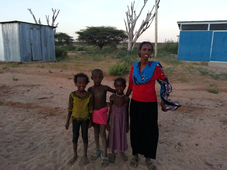 Beatrice with a few local kids. she would always help anyone she can.