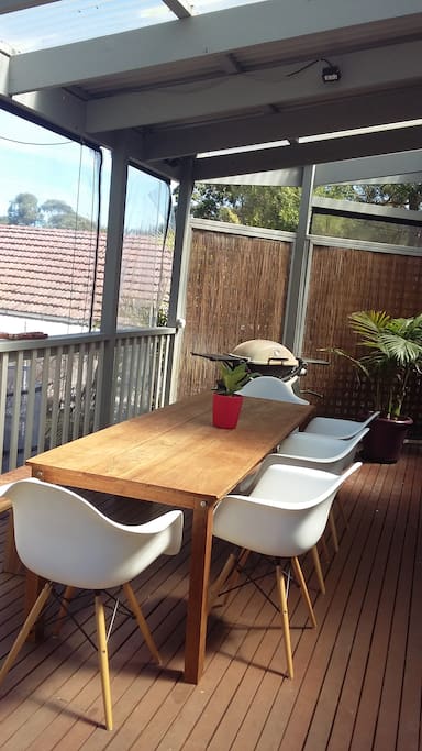 Covered rear deck, worry free BBQ dining