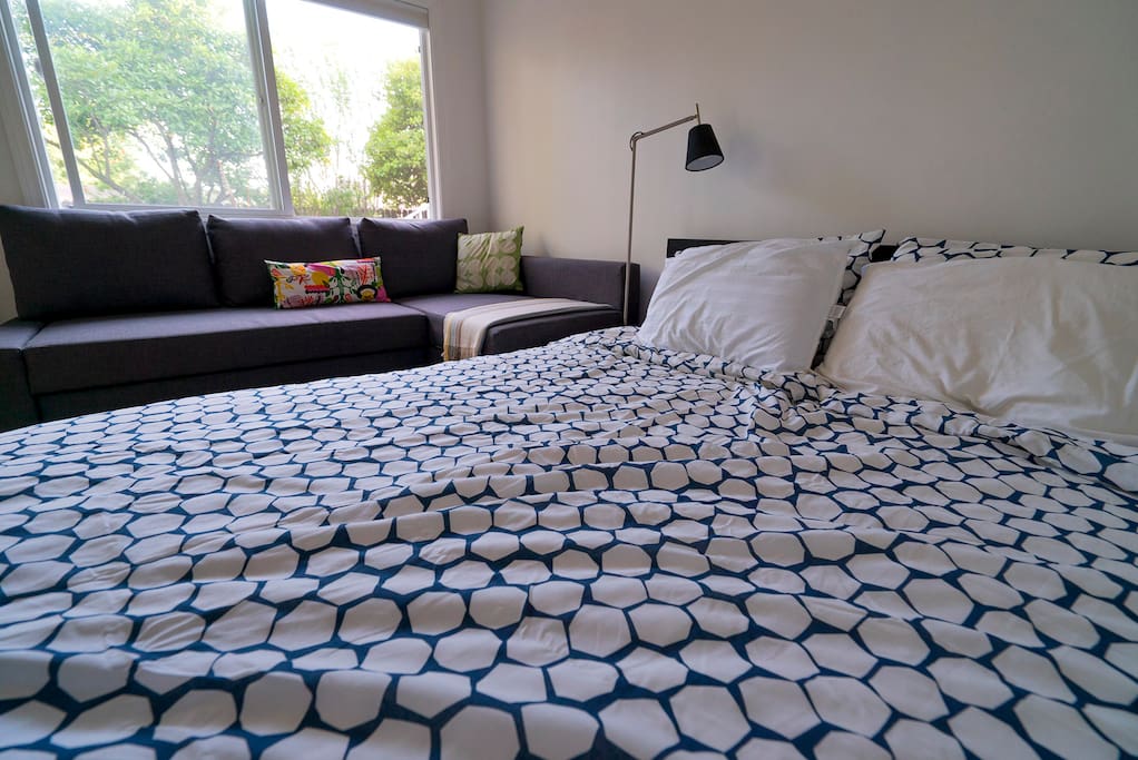 A comfortable queen size bed and pull out sofa.