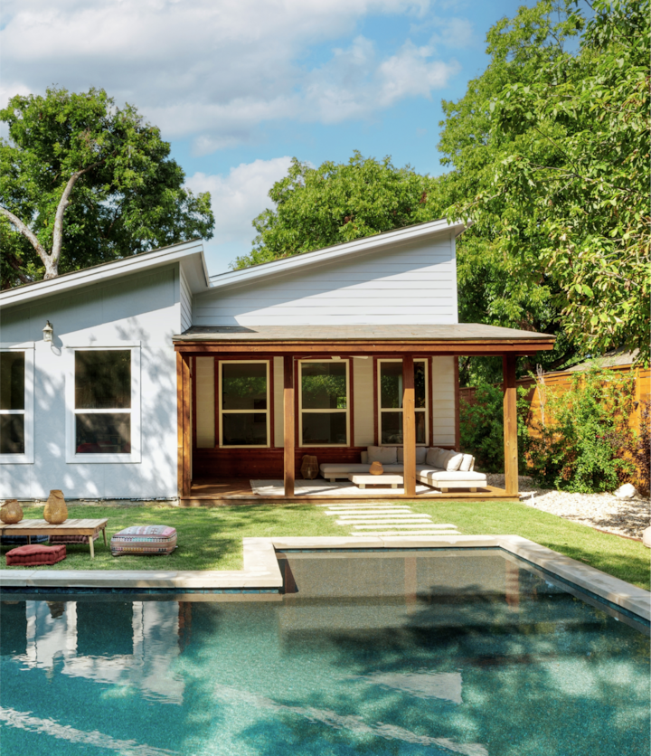 A poolside escape under the hot Austin, Texas sun. A modern backyard patio with caramel brown beams supporting a shaded area for ample rest and relaxation.