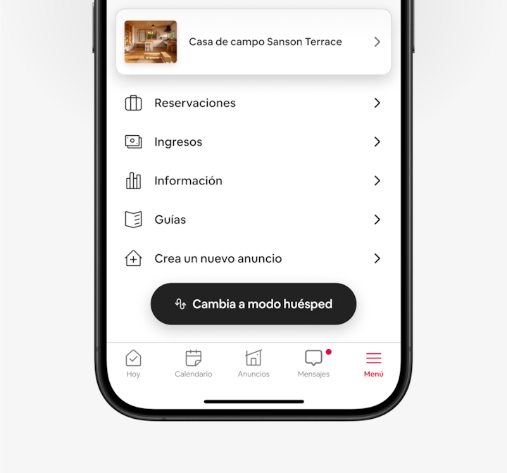 La app de Airbnb muestra un nuevo botón “Cambia a modo huésped” que se toca y abre el modo huésped de la app.