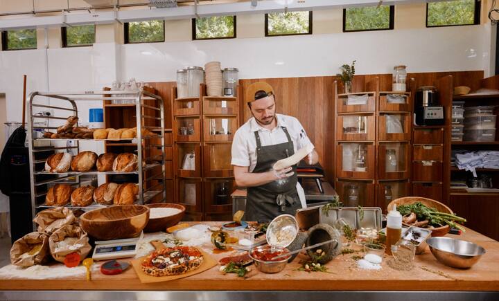 Small business owner prepares food