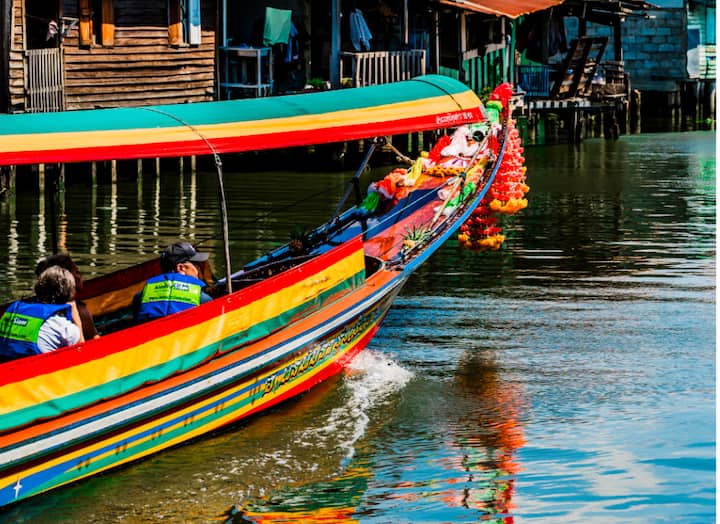 A bright boar on the canal in Bangkok
