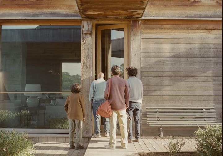 A family arrives at a property in Victoria