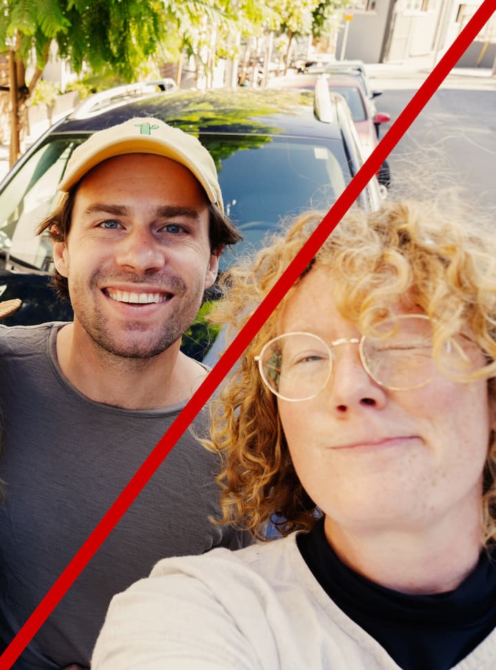 Two people taking a selfie with a red diagonal line across the image, indicating rejection.