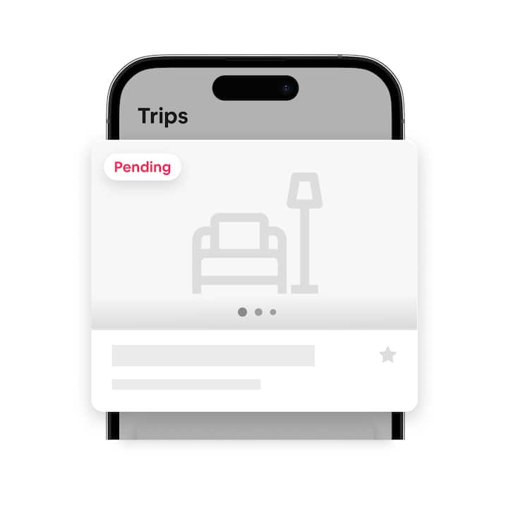 Phone with a grayed-out screen that says “Trips” at the top. In the middle is a white box saying “Pending.”