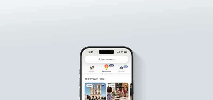 Airbnb app showing three new tabs in the redesigned app representing homes, experiences and services, with experiences highlighted.
