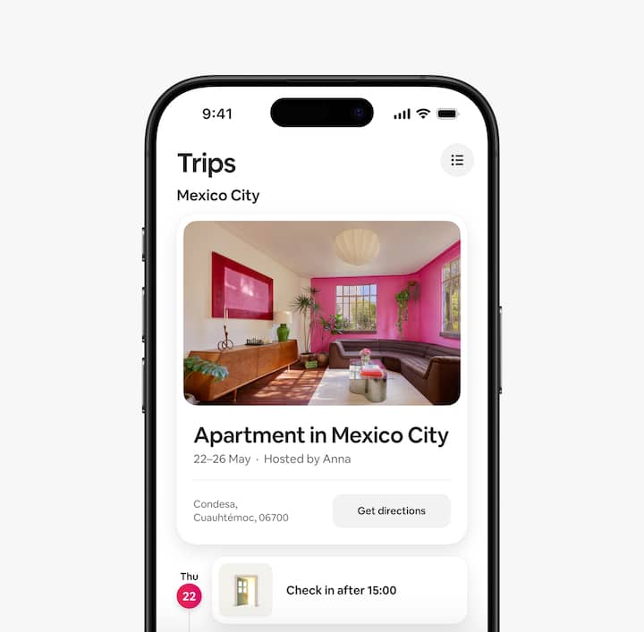 Airbnb app showing the Trips tab featuring details including the check-in time.
