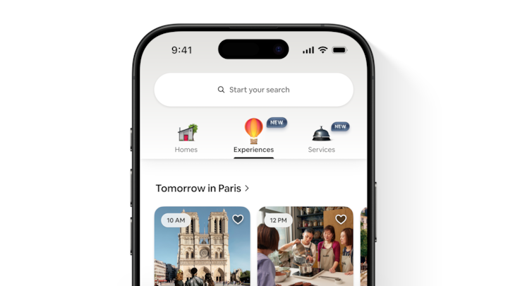 CEO Brian Chesky on stage announcing the launch of Airbnb Services, Airbnb Experiences, and the redesigned Airbnb app.