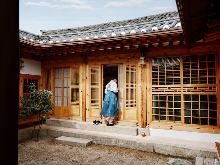 woman entering hanok